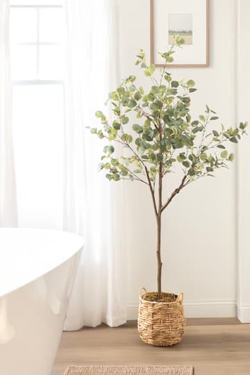 Kate and Laurel 6ft. Eudora Faux Eucalyptus Tree with Natural Planter